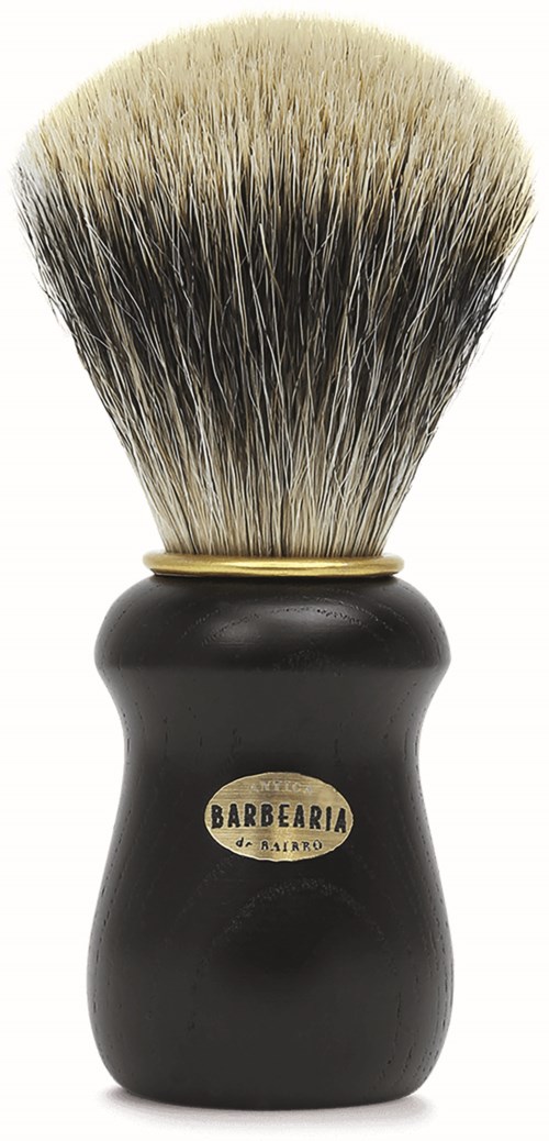A shaving brush with black handle and soft, light-colored bristles, labeled "Barbearia".