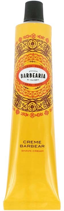 Eine gelbe Tube mit Barbearia Rasiercreme, dekorative schwarze und rote Muster und schwarzer Deckel.