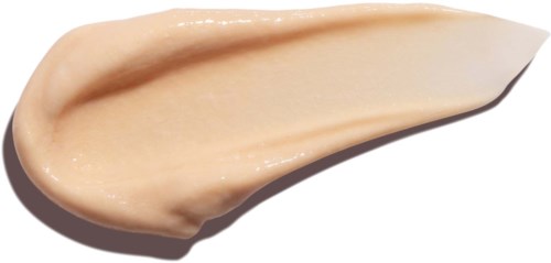 Ein beige, cremiger Brei mit glatter Textur und spitzem Ende.