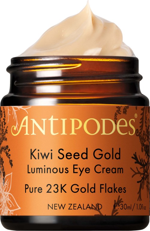 Ein Glas Augencreme mit orangem Label, enthält Kiwi-Samen, Goldflocken und stammt aus Neuseeland.