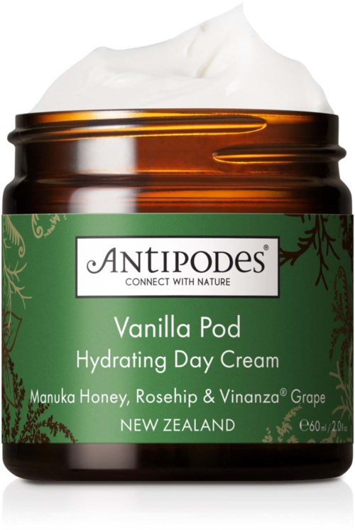 Ein brauner Behälter mit Vanille-Hydrating-Day-Cream, weißen Deckel, mit natürlichen Zutaten aus Neuseeland.