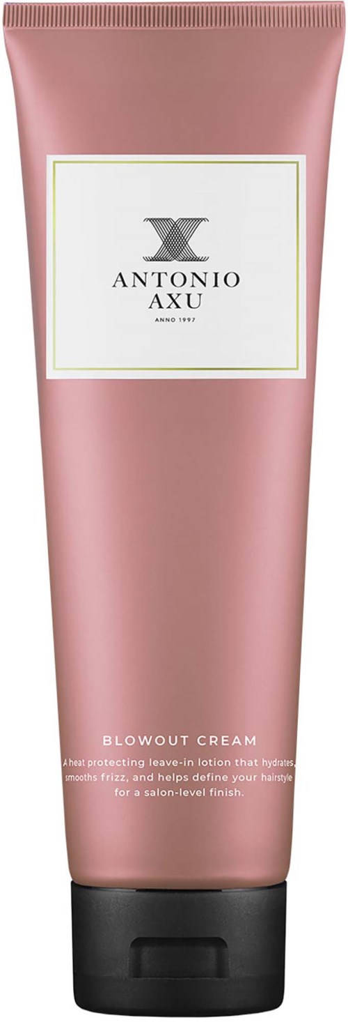 En rosa tube av Antonio Axu Blowout Cream med svart sokk, viser produktetiketten og beskrivelsen.