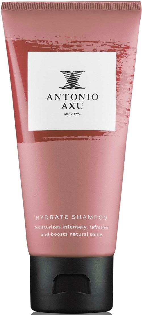 Roze hydraterende shampoo tube met zwarte dop, gemarkeerd Antonio Axu, belooft vocht en glans.