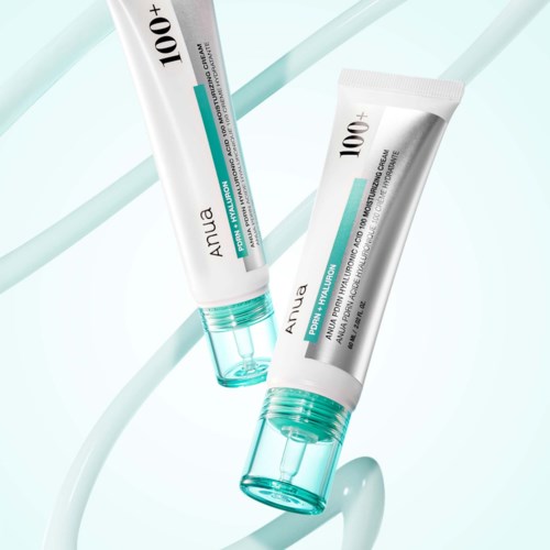 To tuber med hudpleie krem med teal-lokk og hvite kroppsdeler, viser produktnavn og detaljer.