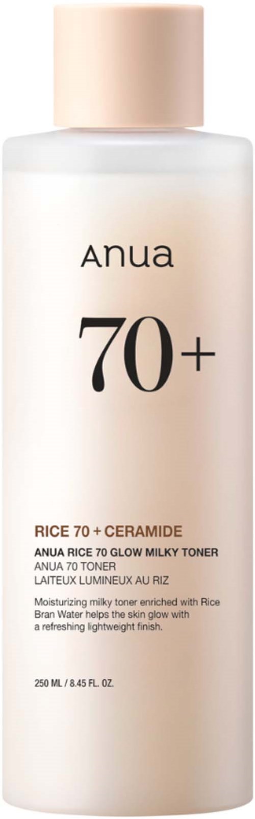 En lang, hvit flaske med Anua Rice 70+ Ceramide fuktighetskrem med beige lokk og produktdetaljer på etiketten.