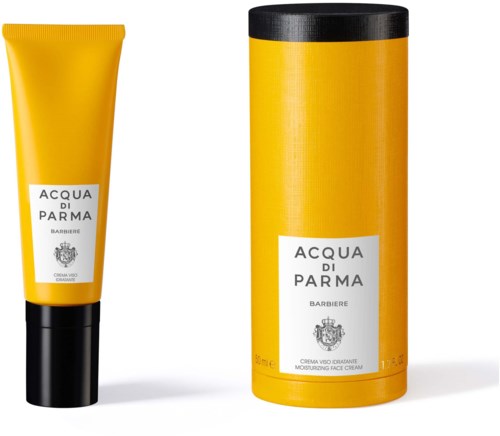 Een gele tube en een bijpassende gele cilindervormige doos, beide gemarkeerd met "Acqua di Parma" en bedoeld voor huidverzorging.