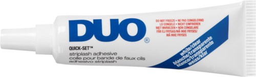 A tube of DUO stripless wax for hair removal, with blue and white packaging and red instructions.