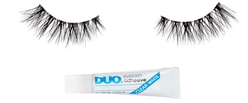 False eyelashes with a tube of eyelash adhesive below. Both are on a black background.