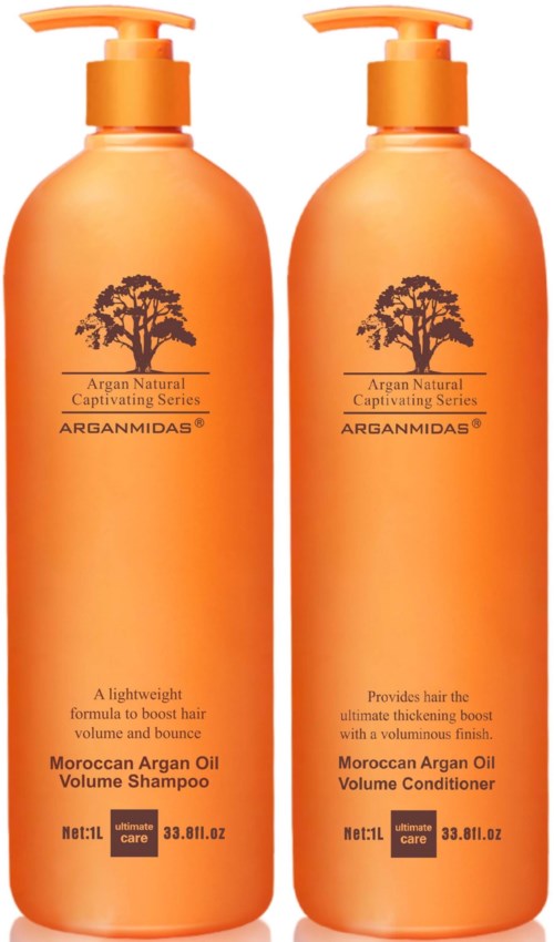 Zwei orange Flaschen von Arganmedas marokkanischem Arganöl-Haarpflegeprodukten, eine ist Shampoo und die andere Conditioner.
