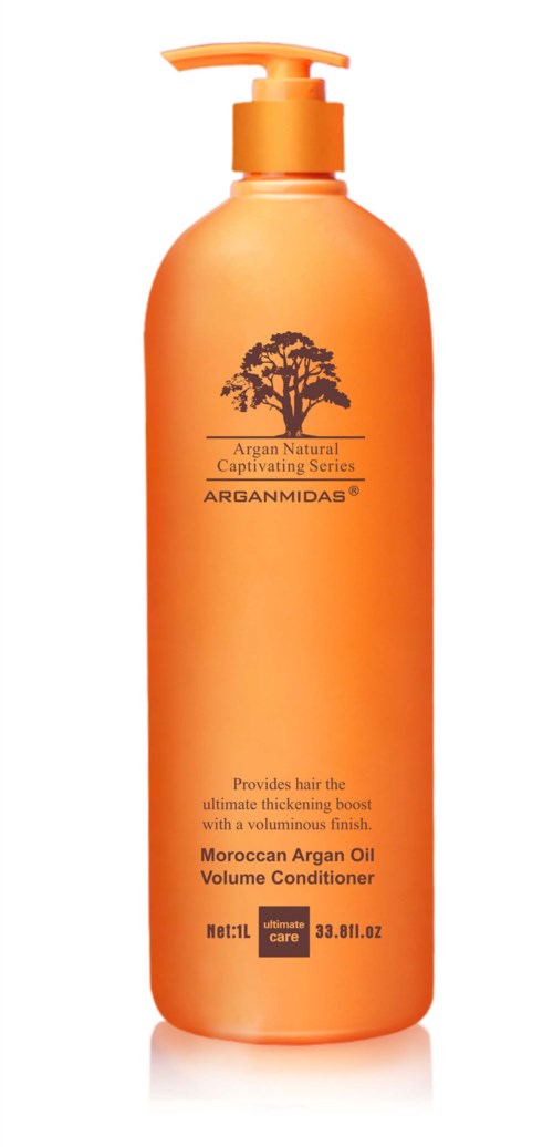 Eine orangefarbene Flasche mit Pumpe, beschriftet Moroccan Argan Oil Volume Conditioner, mit Baum-Logo und Produktdetails.