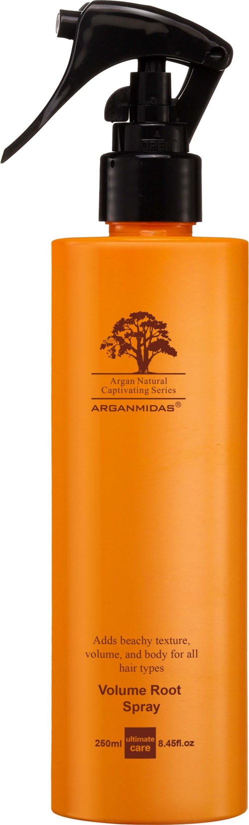 Eine orangefarbene Flasche mit schwarzem Sprühkopf. Mit Baum-Logo, Beschriftung: 'Volume Root Spray'.