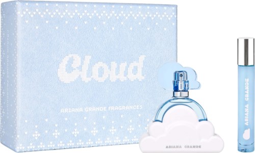 A perfume set with a blue and white cloud-shaped bottle, a light blue spray, and a matching box.