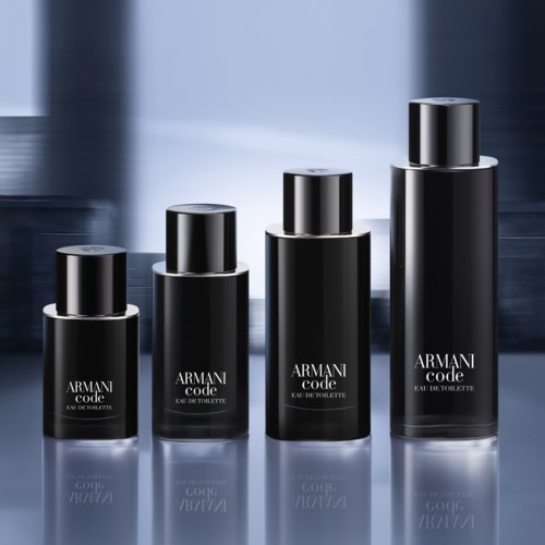Four black perfume bottles of different sizes arranged from small to large, with the label 'ARMANI code'.