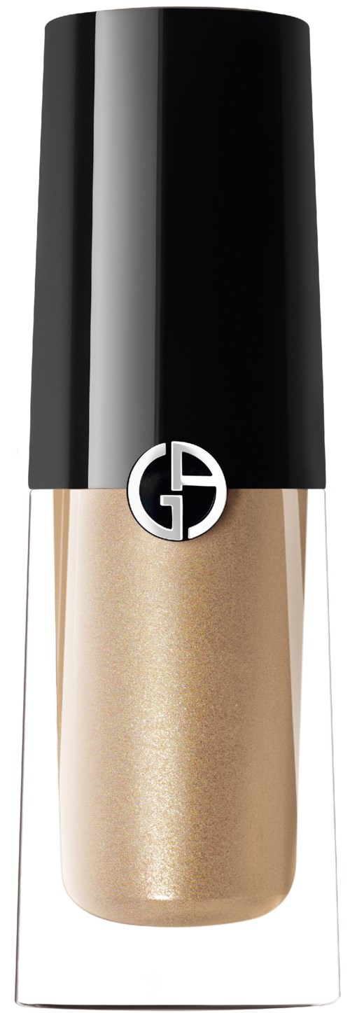 En beige makeuppflaska med svart lock och en silverlogga i mitten.