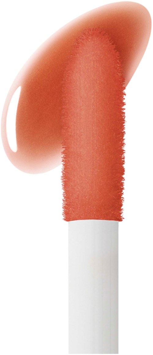 A makeup brush with peach-colored powder on a white handle.