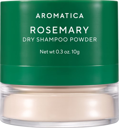 Een groene container met de tekst 'Aromatica Rosemary Dry Shampoo Powder' met witte tekst, met beige poeder erin.