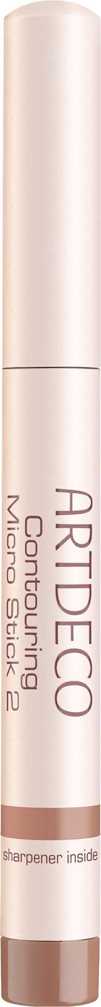 Ett beige och vitt makeup-verktyg som liknar en penna med text om ARTDECO och concealer.