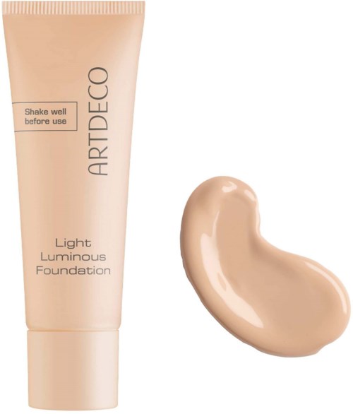 En tub med foundation och en klick beige färg bredvid. Rådet är att skaka innan användning.