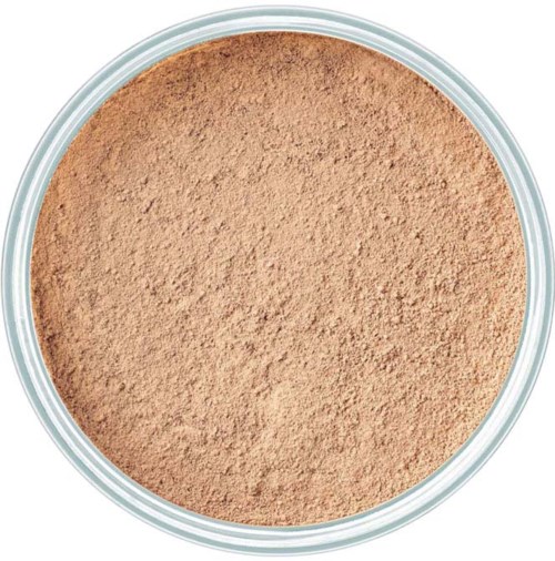 A round container holding light brown powder, possibly makeup or a cosmetic product.