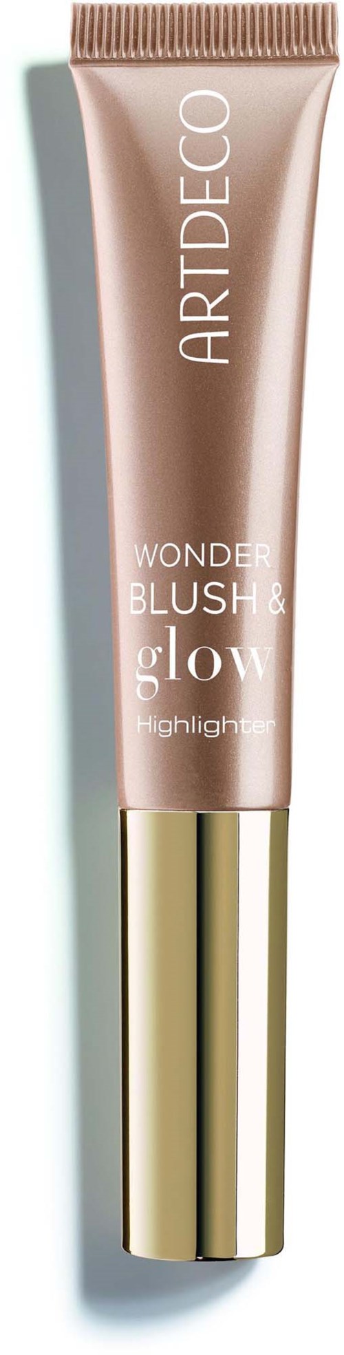 Een beige en gouden tube van ARTDECO Wonder Blush & Glow highlighter met dop. Hij is verticaal en slank.