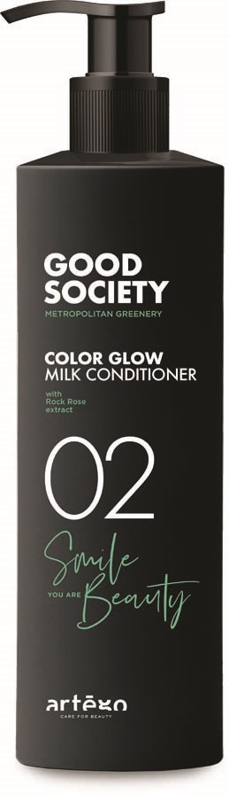 A black bottle of Good Society Color Glow Milk Conditioner with a pump. It features white and green text about beauty and smile.
