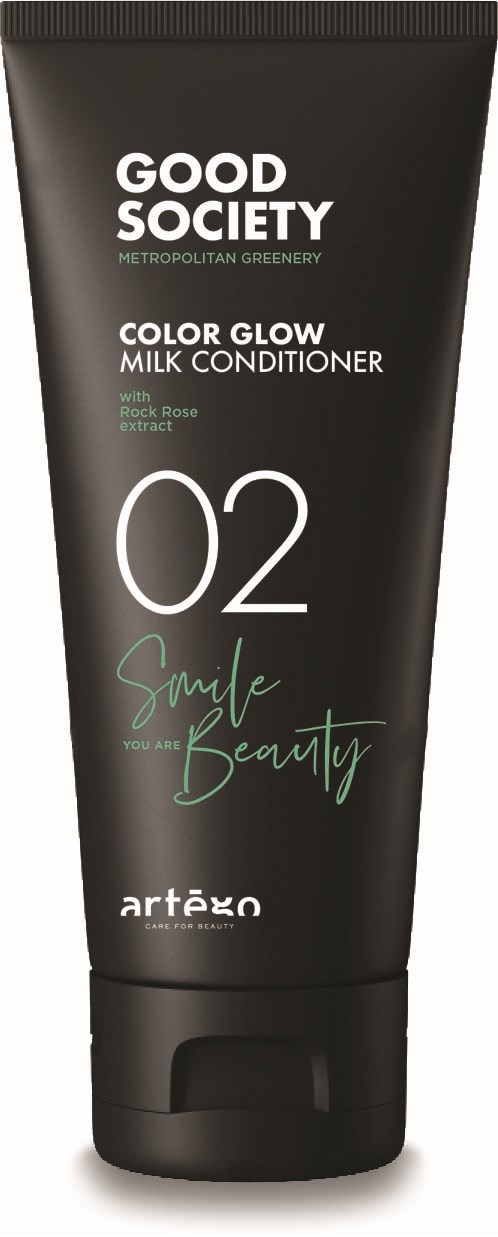 A black tube of Good Society Color Glow Milk Conditioner with Green and white text and a flip cap.