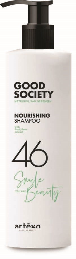En vit schampoflaska med svart pump, märkt "Good Society" och "Nourishing Shampoo" med gröna och svarta texter.