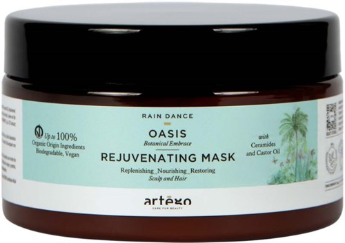 En burk märkt Oasis Rejuvenating Mask med en tropisk palmträd design, innehållande en närande hår- och skalpbehandling.