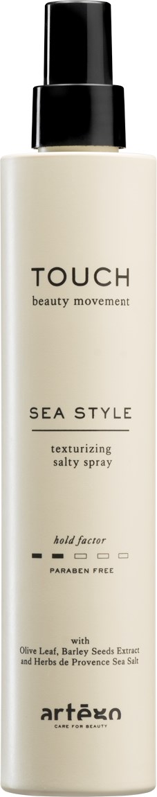 A tall, white bottle with a black spray nozzle. It has text showing the product name and details.