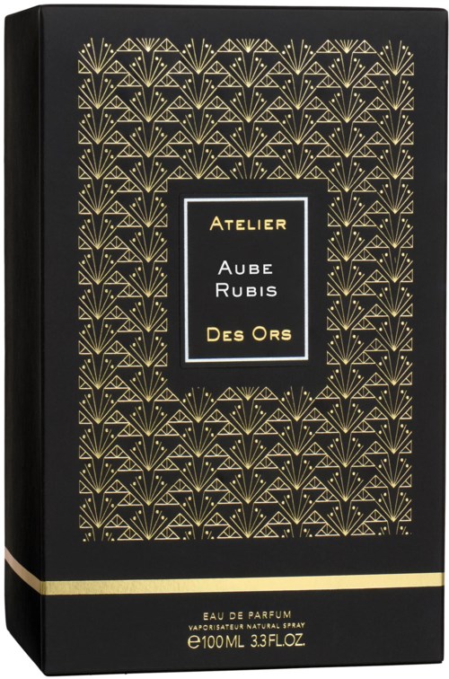 A black perfume box with gold geometric patterns and a central label displaying the brand and scent name.