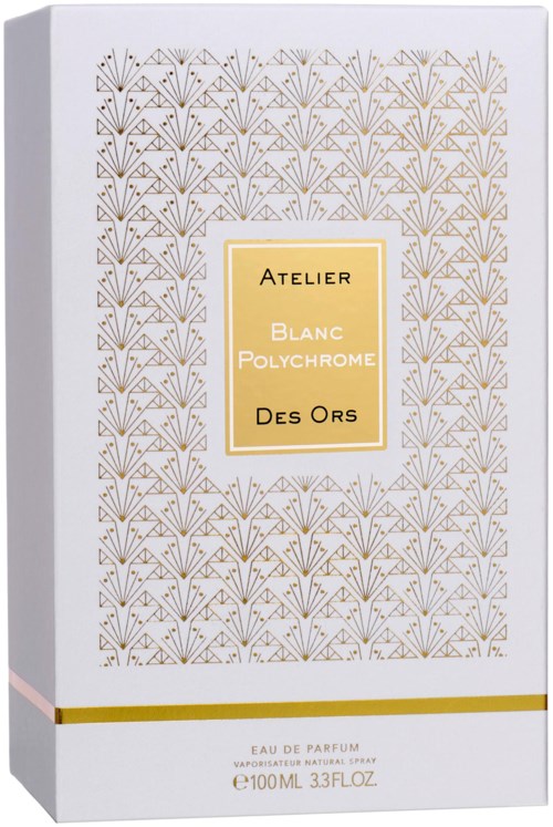 A perfume box with a white and gold design, featuring a pattern and a label with text in the center.