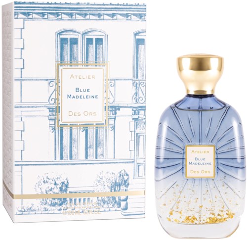 A perfume bottle with a blue design and gold cap, next to a matching box with blue and white building illustration.