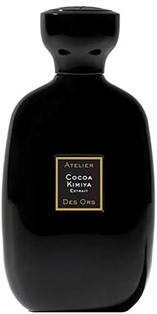 A sleek black bottle with a label reading "Atelier Cocoa Kimiya Extract Des Ors." It has a smooth, rounded shape.