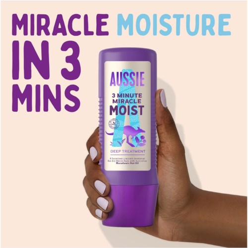 A hand holds a purple bottle with blue and purple text, promoting a moisturizer that works in three minutes.