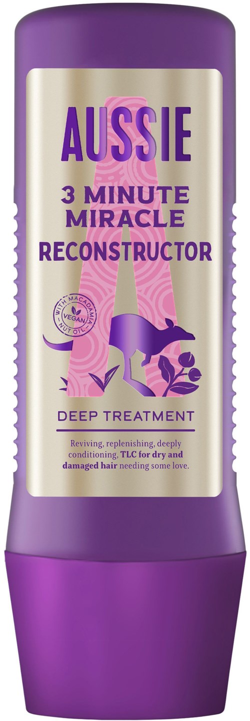 Purple bottle with label about deep treatment and revitalizing hair. It mentions a 3-minute miracle reconstructor for damaged hair.