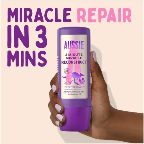 Hand holding a purple bottle with text about a quick skin repair product, claiming miracle effects in three minutes.