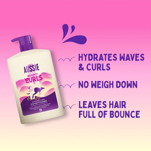 A pink background with a white bottle of Aussie Bouncy Eurls conditioner and key benefits listed.
