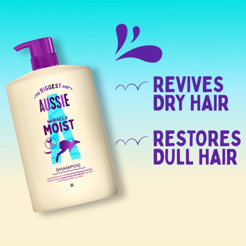 A shampoo bottle with a purple pump features a dolphin, promoting hair revival and restoration.