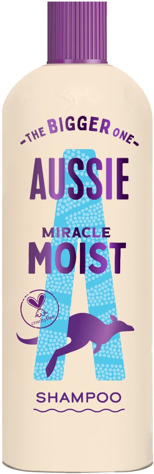 A shampoo bottle with purple cap, colorful text, and a jumping dog illustration on a beige background.