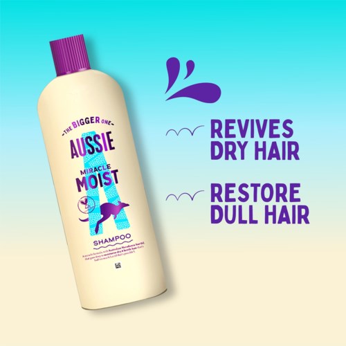 A shampoo bottle labeled Aussie Miracle Moist that revives dry hair and restores dull hair.