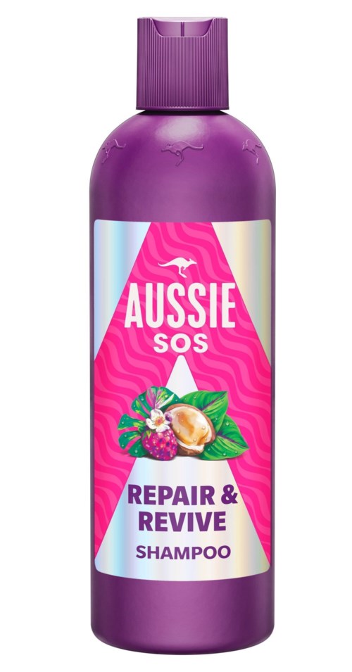 A purple bottle of Aussie SOS Repair & Revive Shampoo with a pink and purple label featuring floral and fruit images.
