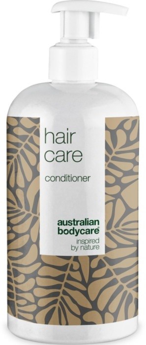 En genomskinlig plastflaska med pump, märkt 'hair care conditioner' från Australian Bodycare, dekorerad med lövmönster.