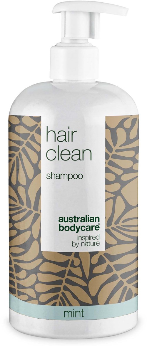 En hvit schampo-flaske med pumpe, merket hair clean, australian bodycare, og mintlukt.