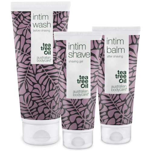 Tre tuber med personlig pleie: vask, barbergelé og balm, med lilla bladmønster og te-tre olje .