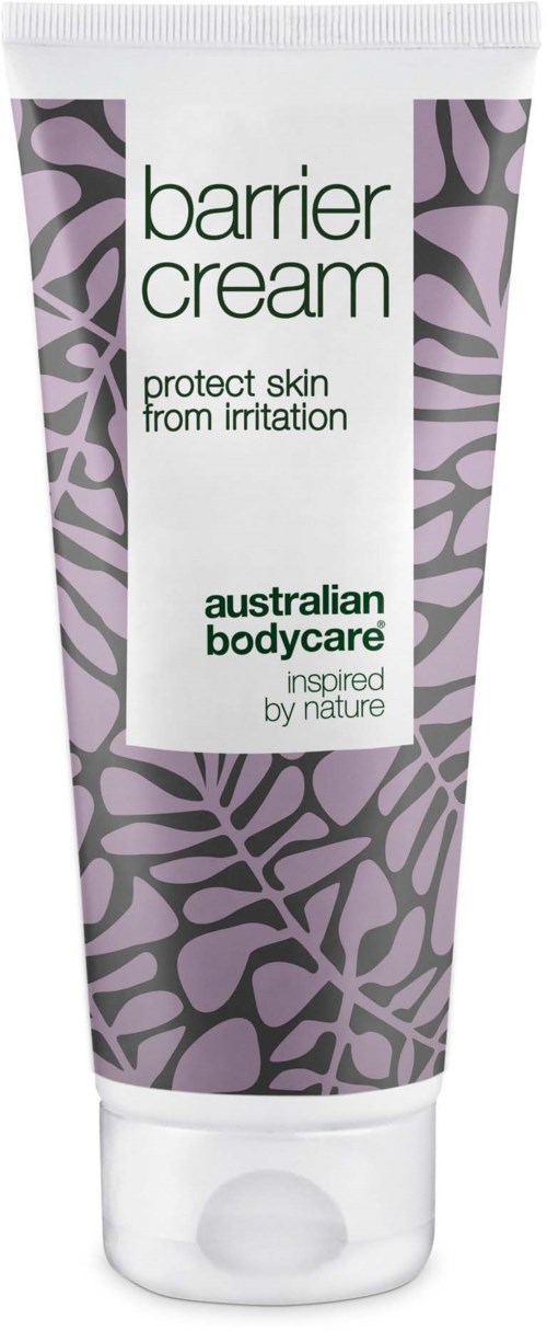 A white tube with purple leaf patterns, labeled "barrier cream," for skin protection against irritation, by Australian Bodycare.