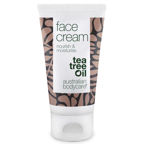 Eine weiße Tube mit 'Gesichtspflege' Beschriftung, Pflanzenmuster, enthält Teebaumöl, von Australian Bodycare.