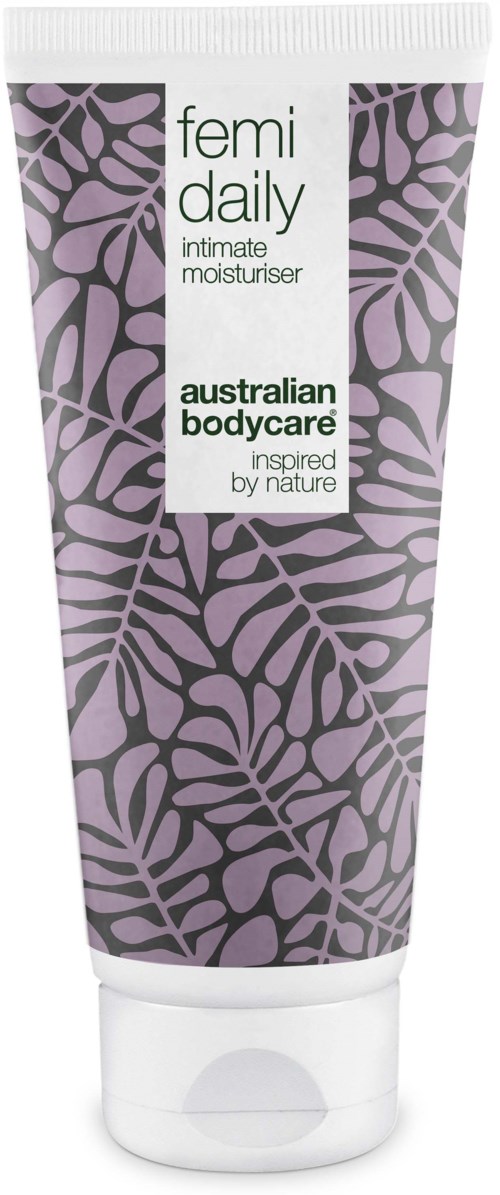 A tube of Femi Daily intimate moisturizer with purple leaf patterns and green and white text.