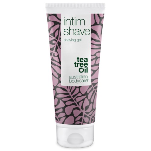 Eine Tube Intimrasiergel mit Teebaumöl, dunkelviolettes Blumenmuster, weiße Etikette und grüner Text.