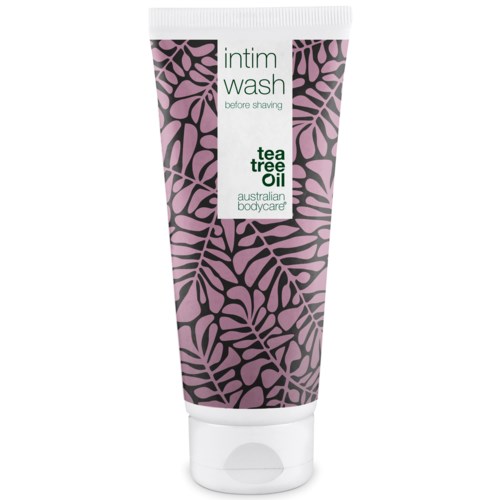 Eine Tube mit 'intim wash'-Aufschrift, rosa und schwarze Blattmuster, enthält Teebaumöl aus Australien.
