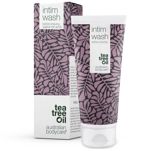 Eine Tube Intimwaschgel mit lila Blattmuster, genannt Tea Tree Oil von Australian Bodycare, und deren Verpackung.